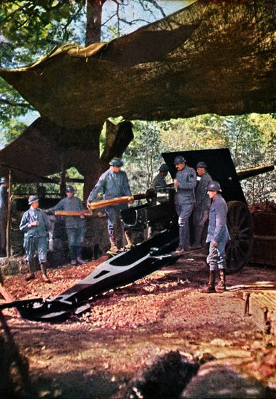 A French battery of heavy guns under camouflage netting in the forest, Verdun, September 1916 by Jules Gervais Courtellemont